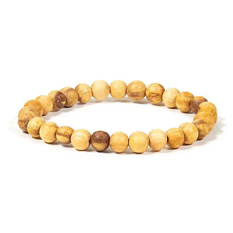 Bracelet élastique Palo Santo avec perles rondes naturelles de 6 mm, bijou spirituel artisanal pour relaxation et purification énergétique.