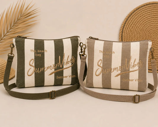 Sac pochette rayé Summer Vibes avec bandoulière et fermeture zip, style estival chic pour femme.