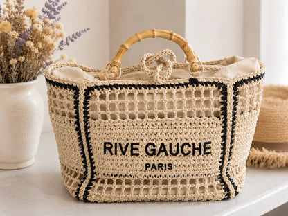 Sac cabas tressé femme style bohème “Rive Gauche” noir et beige avec poignées effet bambou, grand format élégant pour la plage et les vacances.