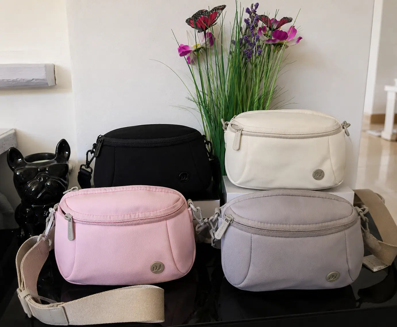Sac banane femme David Jones avec double fermeture zippée et bandoulière réglable, disponible en plusieurs coloris tendance.